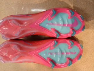 Botas de fútbol Nike Mercurial Rojas y Turquesa