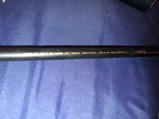 Caña y carrete de pesca