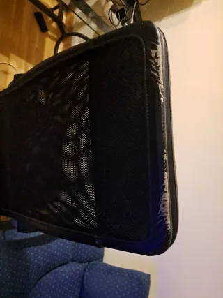 Sillón de oficina ergonómico respaldo agujereado