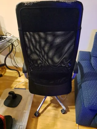 Sillón de oficina ergonómico respaldo agujereado