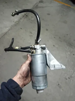 Soporte y filtro Gasoil Audi A6 C4 100 2.5tdi