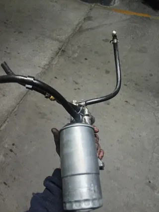 Soporte y filtro Gasoil Audi A6 C4 100 2.5tdi