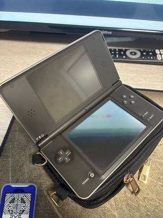 Nintendo DSi XL Bronce + 4 Giochi