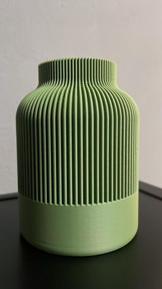 Vaso design verde in plastica.