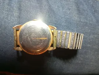 Reloj de pulsera vintage dorado y plateado