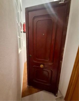 Portón blindado madera