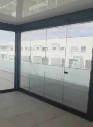 CERRAMIENTOS DE CORTINAS DE CRISTAL