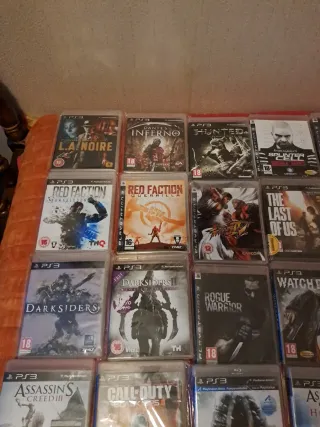 PS3 slim de 500 gigas,dos mandos y 70 juegazos