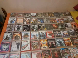 PS3 slim de 500 gigas,dos mandos y 70 juegazos