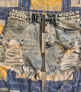 Shorts jeans con borchie taglia L