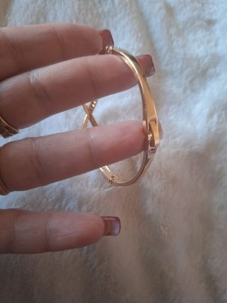 Pulsera caña infinito dorada acero