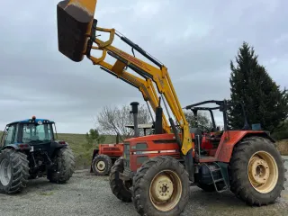 Tractor con pala frontal 670312823