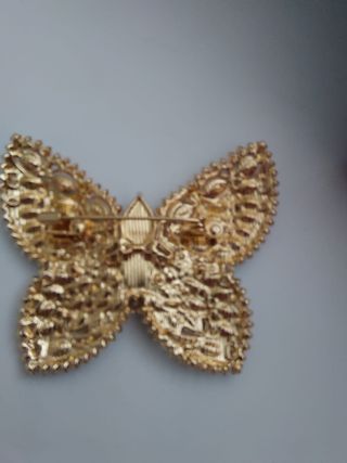 Broche mariposa con pedrería dorado plateado moda
