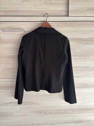 Blazer negro y top naranja Talla M