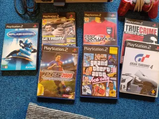PlayStation 2 con 7 juegos y 2 mandos