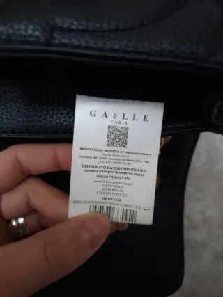 Borsa Gaëlle Paris nera con tracolla oro