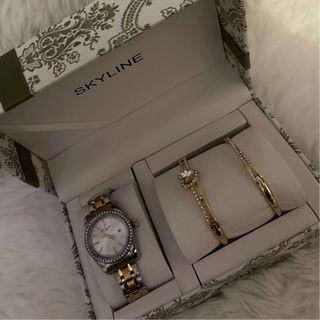 Reloj SKYLINE oro y plata