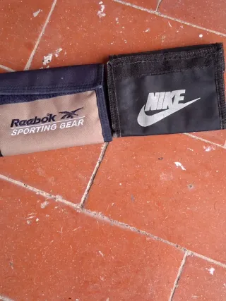 2 Carteras Nike y Reebok