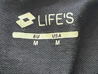 Maglietta Lotto nera con dettagli rosa