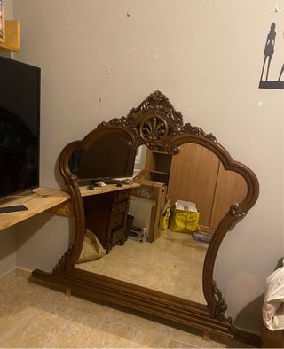 Espejo de madera tallada