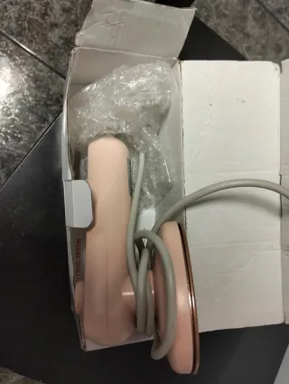 Plancha de ropa eléctrica rosa