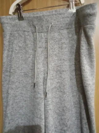 Pantalones grises acampanados talla M