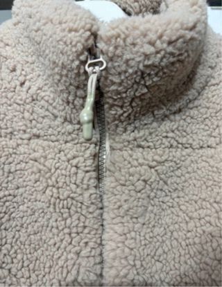 Giubbotto in pelliccia beige corto