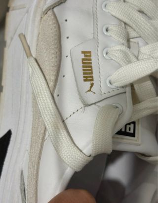 Scarpe Puma bianche e nere