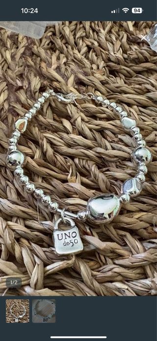 Pulsera Plata con Dijes modelo uno de 50