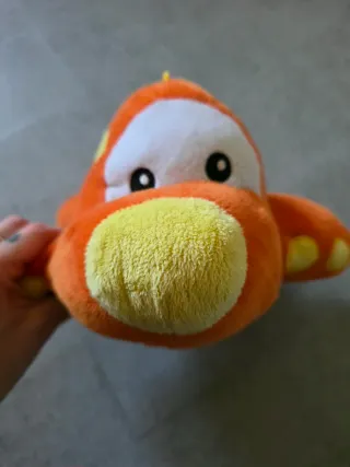 Peluche aeroplano arancione