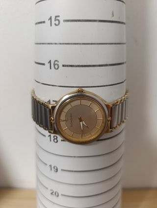 Reloj Yves Saint Laurent unisex oro y plata