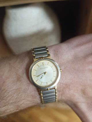 Reloj Yves Saint Laurent unisex oro y plata