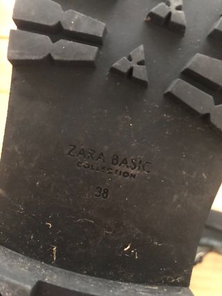 Botines de piel negros con tachuelas T.38