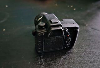 USB a forma di fotocamera Nikon