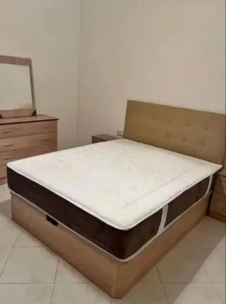 Canapé abatible blanco con colchón