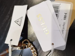 Borsa Guess Mezzaluna tracolla catena