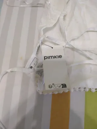 Top blanco bordado con tiras