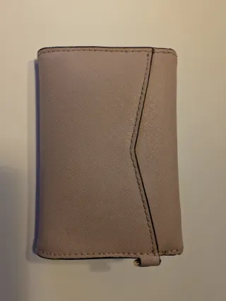 Monedero Michael Kors rosa con estrellas doradas