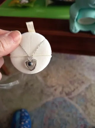 Osito azul con colgante de corazón