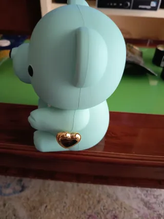 Osito azul con colgante de corazón