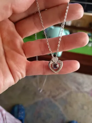 Osito azul con colgante de corazón