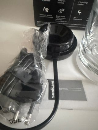 Cargador y Vaso de cristal Philips Sonicare 9400