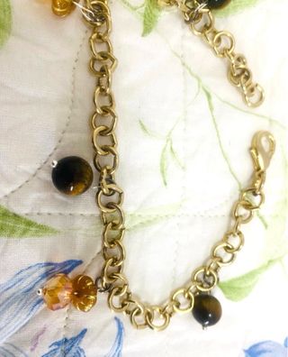Bracciale cavigliera dorata con ciondoli