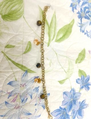 Bracciale cavigliera dorata con ciondoli