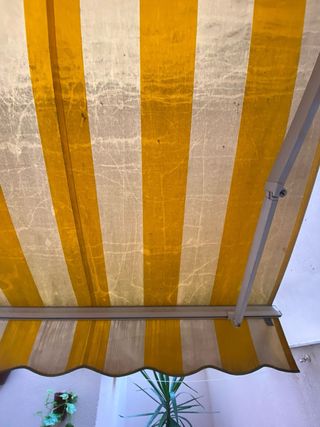 Toldo de tela manual