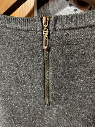 Jersey gris brillante con cremallera