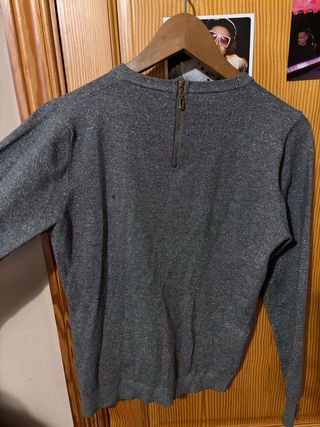 Jersey gris brillante con cremallera