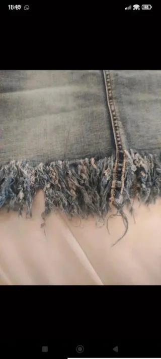 Falda vaquera con flecos