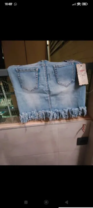 Falda vaquera con flecos