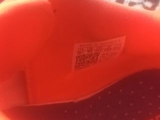 Zapatillas fútbol sala azules y naranjas